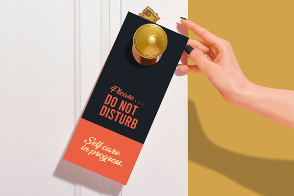 Front View of a Door Hanger on Doorknob Mockup