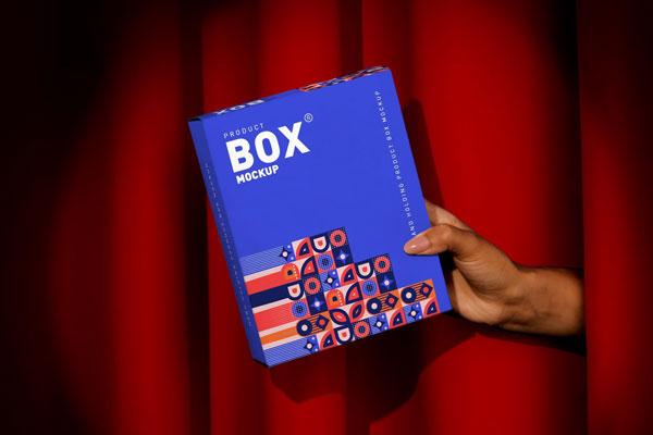 Front View of a Hand Holding a Product Box Mockup