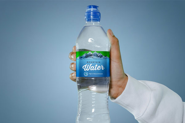 Front View of a Hand Holding a Water Bottle Mockup