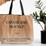 Front View of a Hand Holding Canvas Bag Mockup