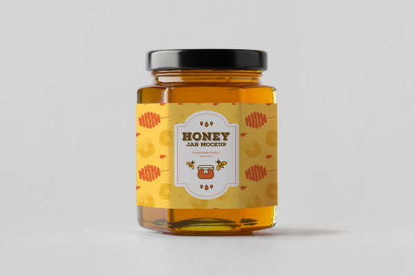 Front View of a Hexagonal Honey Jar Mockup with a Lid