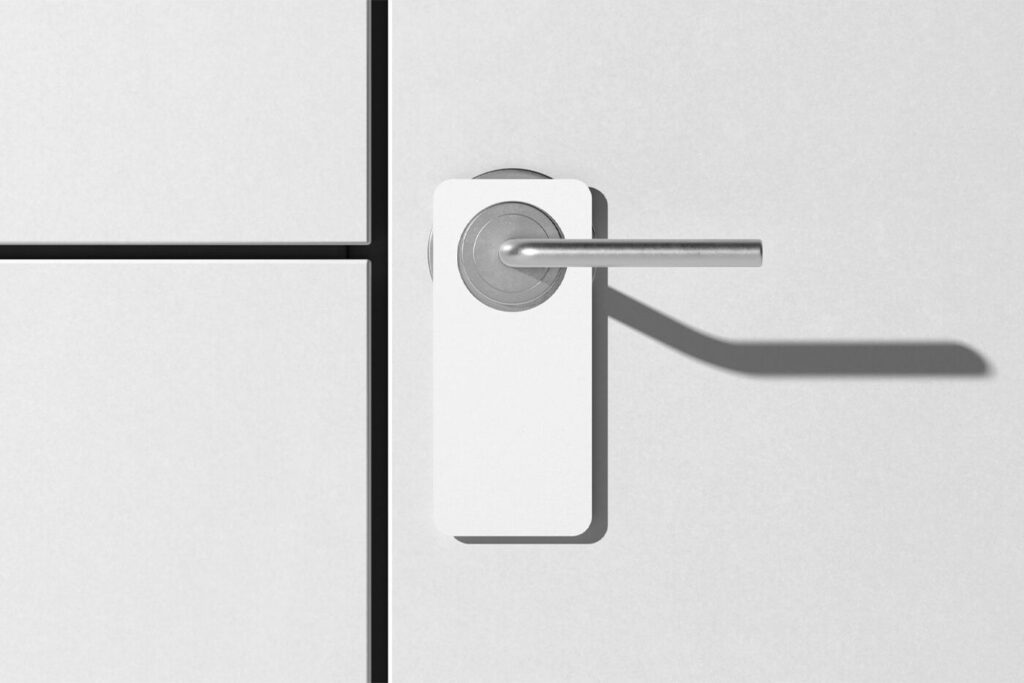 Front View of a Modern Door Hanger Mockup