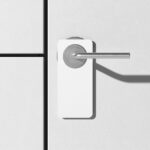 Front View of a Modern Door Hanger Mockup