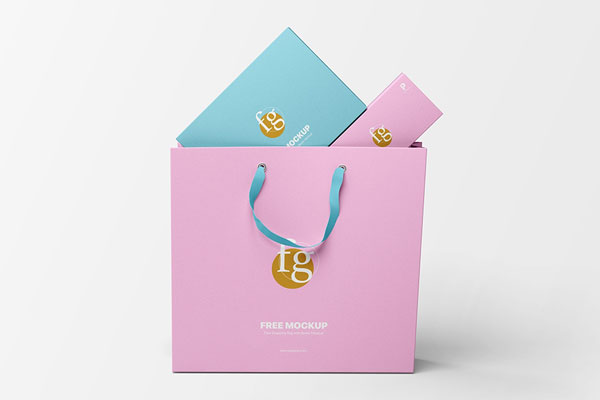 Front View of a Shopping Bag with Boxes Mockup