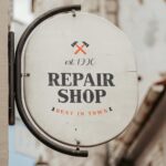 Front View of a Vintage Round Shop Sign Mockup
