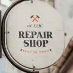 Front View of a Vintage Round Shop Sign Mockup