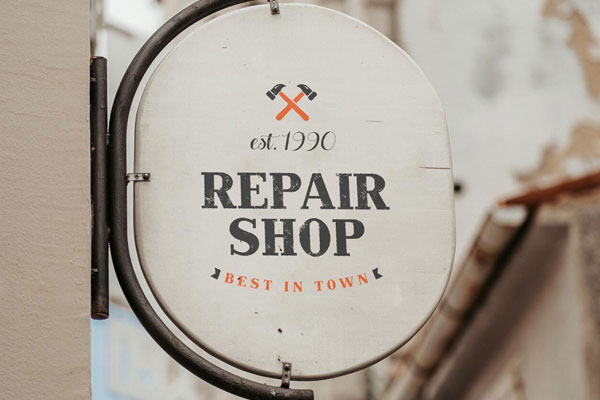 Front View of a Vintage Round Shop Sign Mockup
