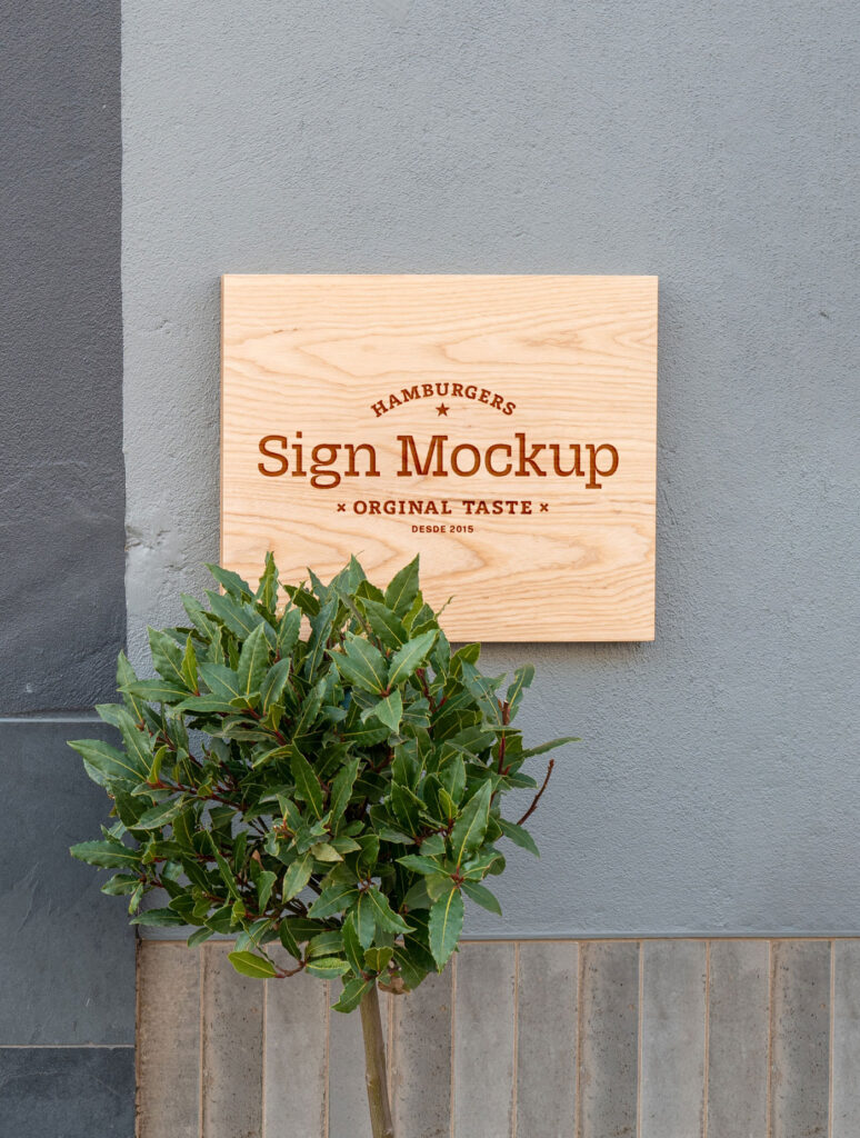 Front View of a Wooden Shop Sign on Wall Mockup