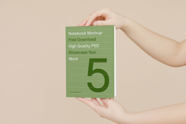 Front View of Book in Hands Mockup