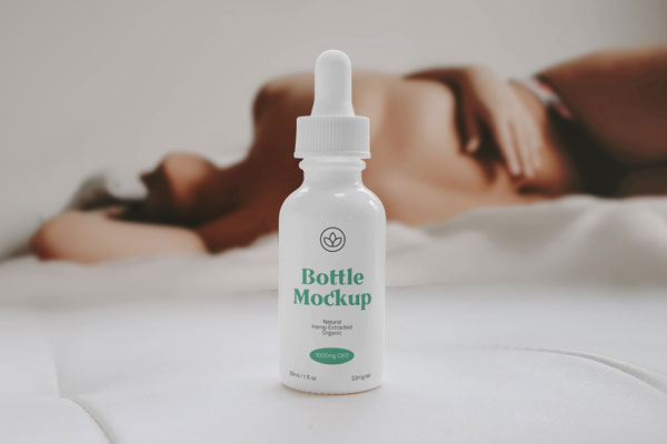 Front View of Bottle Dropper Mockup with Woman