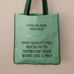 Front View of Canvas Shopping Bag Mockup in Hand