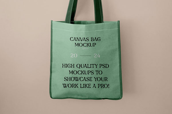 Front View of Canvas Shopping Bag Mockup in Hand