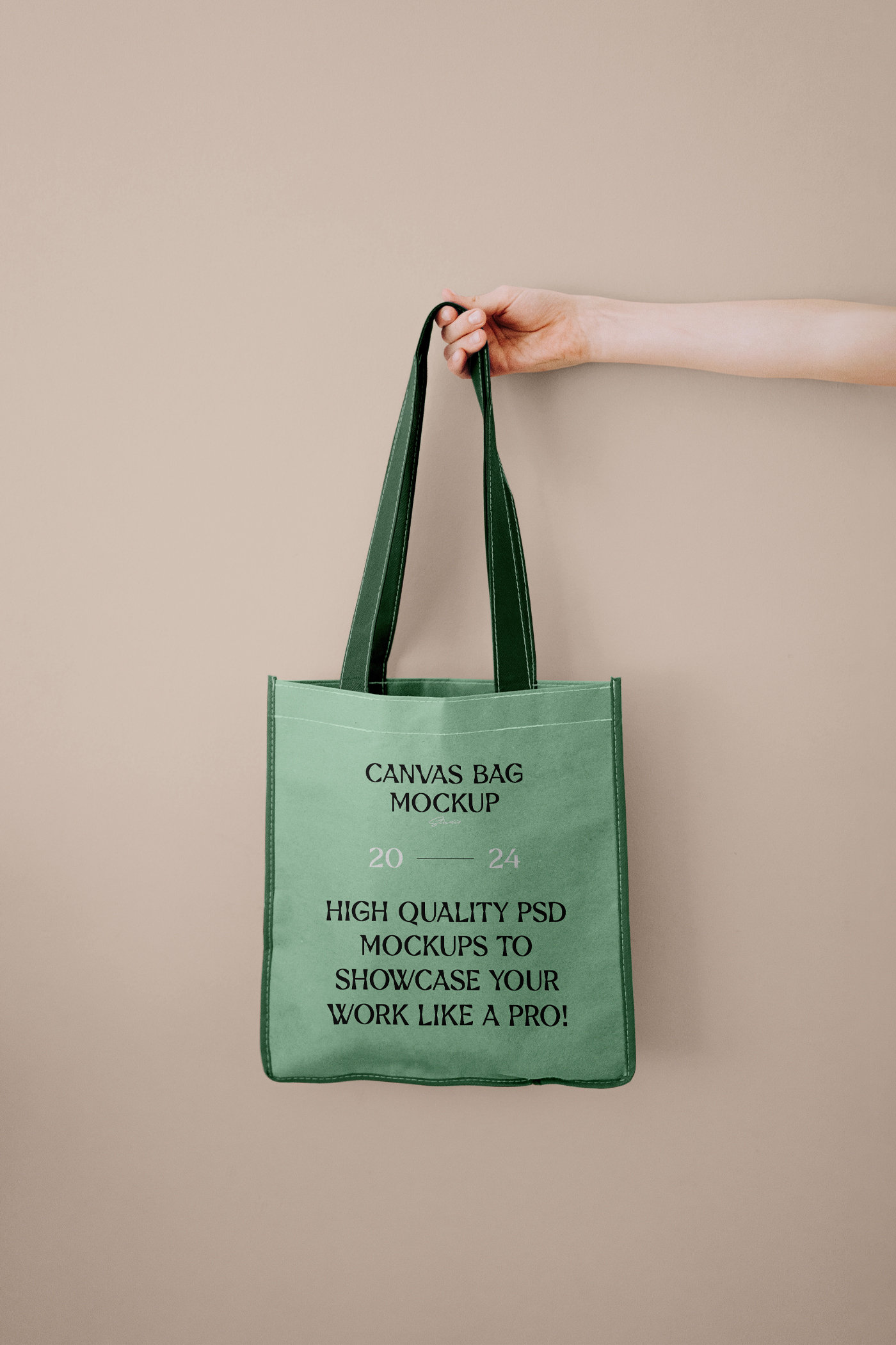 Front View of Canvas Shopping Bag Mockup in Hand FREE PSD