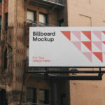 Front View of City Billboard Mockup on Side of Building