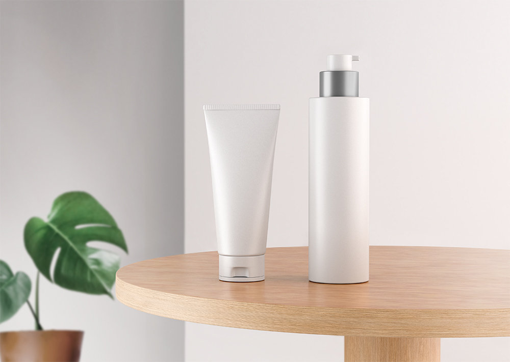 Front View of Cosmetic Tube and Pump Bottle Mockup