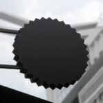 Front View of Decorative Metallic Rounded Sign Mockup