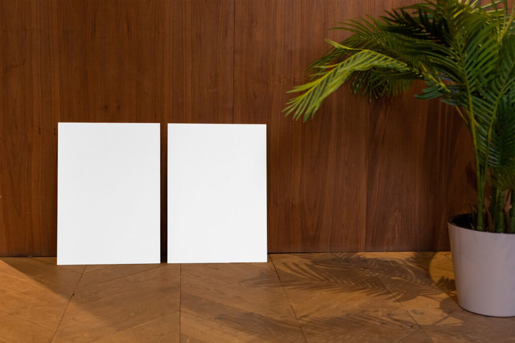 Front View of Double Vertical Poster Mockup on Wooden Setting