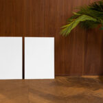Front View of Double Vertical Poster Mockup on Wooden Setting