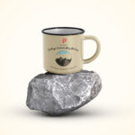 Front View of Enamel Mug on Piece of Rock Mockup