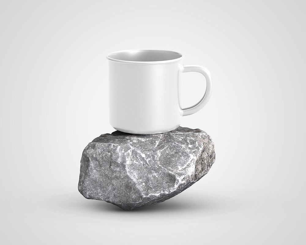 Front View of Enamel Mug on Piece of Rock Mockup FREE PSD