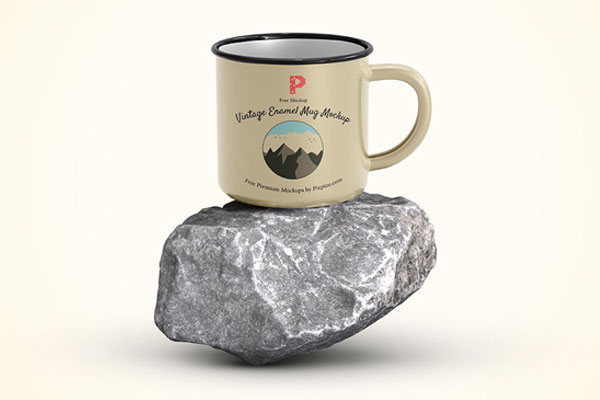 Front View of Enamel Mug on Piece of Rock Mockup