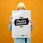 Front View of Female Holding Huge Poster Mockup