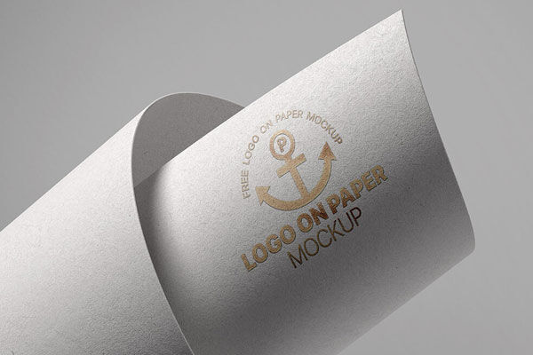 Front View of Gold Foil Logo on Folded Paper Mockup