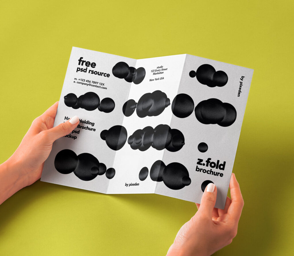 Front View of Hand-holding 3Fold Brochure Mockup
