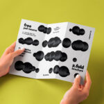 Front View of Hand-holding 3Fold Brochure Mockup