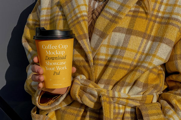 Front View of Hand Holding Coffee Cup Mockup