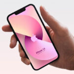 Front View of Hand Holding iPhone 13 Mockup