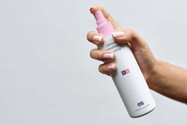 Front View of Hand Holding Lean Spray Bottle Mockup