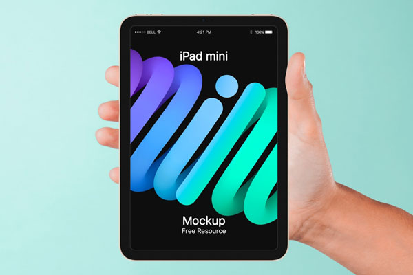 Front View of Hand Holding Mini iPad Mockup