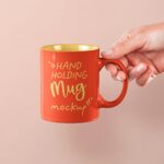 Front View of Hand Holding Mug Mockup