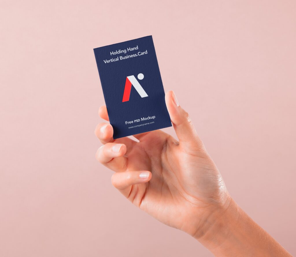Front View of Hand Holding Vertical Business Card Mockup