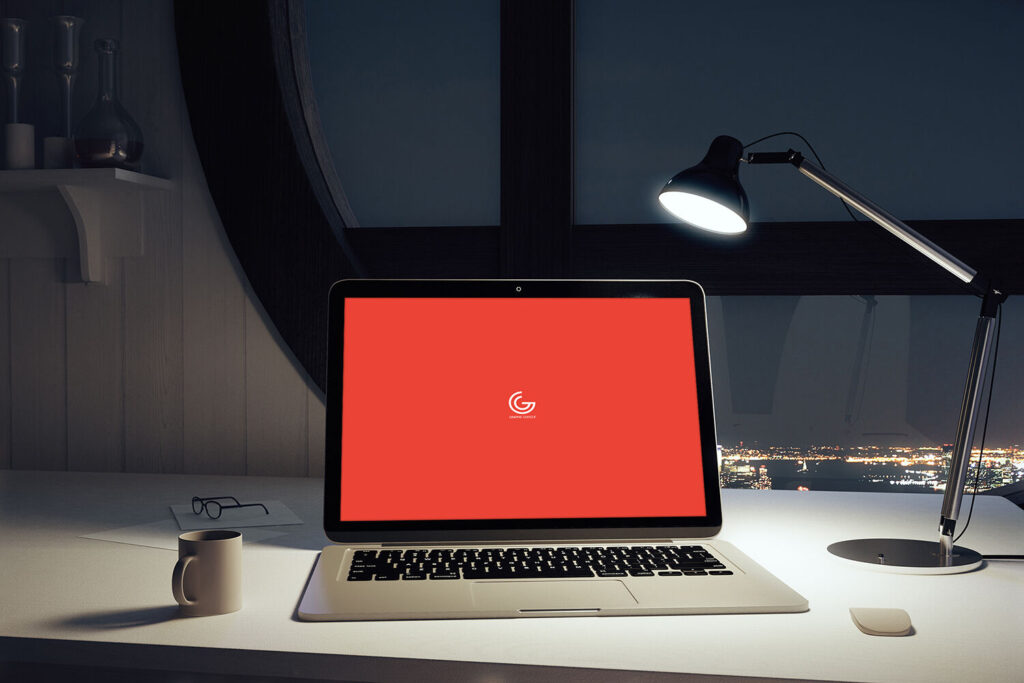 Front View of Laptop Screen Mockup in Office Environment