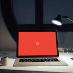 Front View of Laptop Screen Mockup in Office Environment