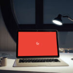Front View of Laptop Screen Mockup in Office Environment