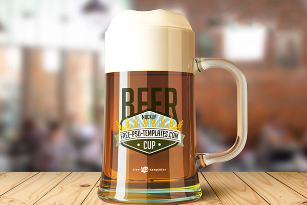 Front View of Large Beer Glass Cup on Wooden Table Mockup