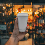 Front View of Man Holding Paper Cup Mockup