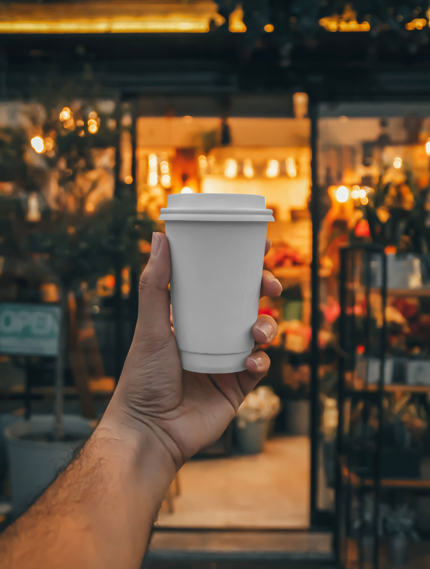Front View of Man Holding Paper Cup Mockup FREE PSD