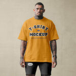Front View of Man Wearing Oversize T-Shirt and Shorts Mockup