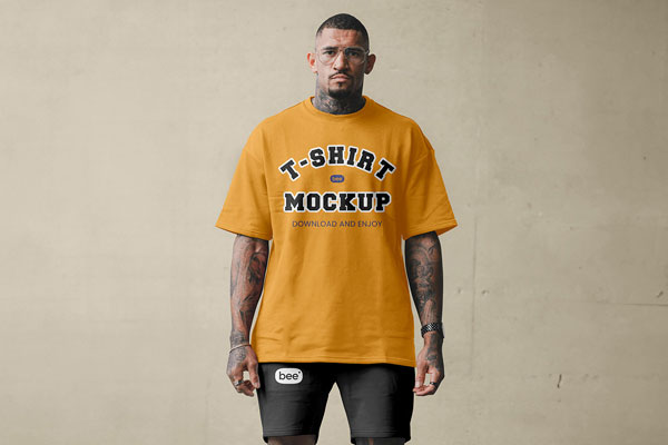 Front View of Man Wearing Oversize T-Shirt and Shorts Mockup