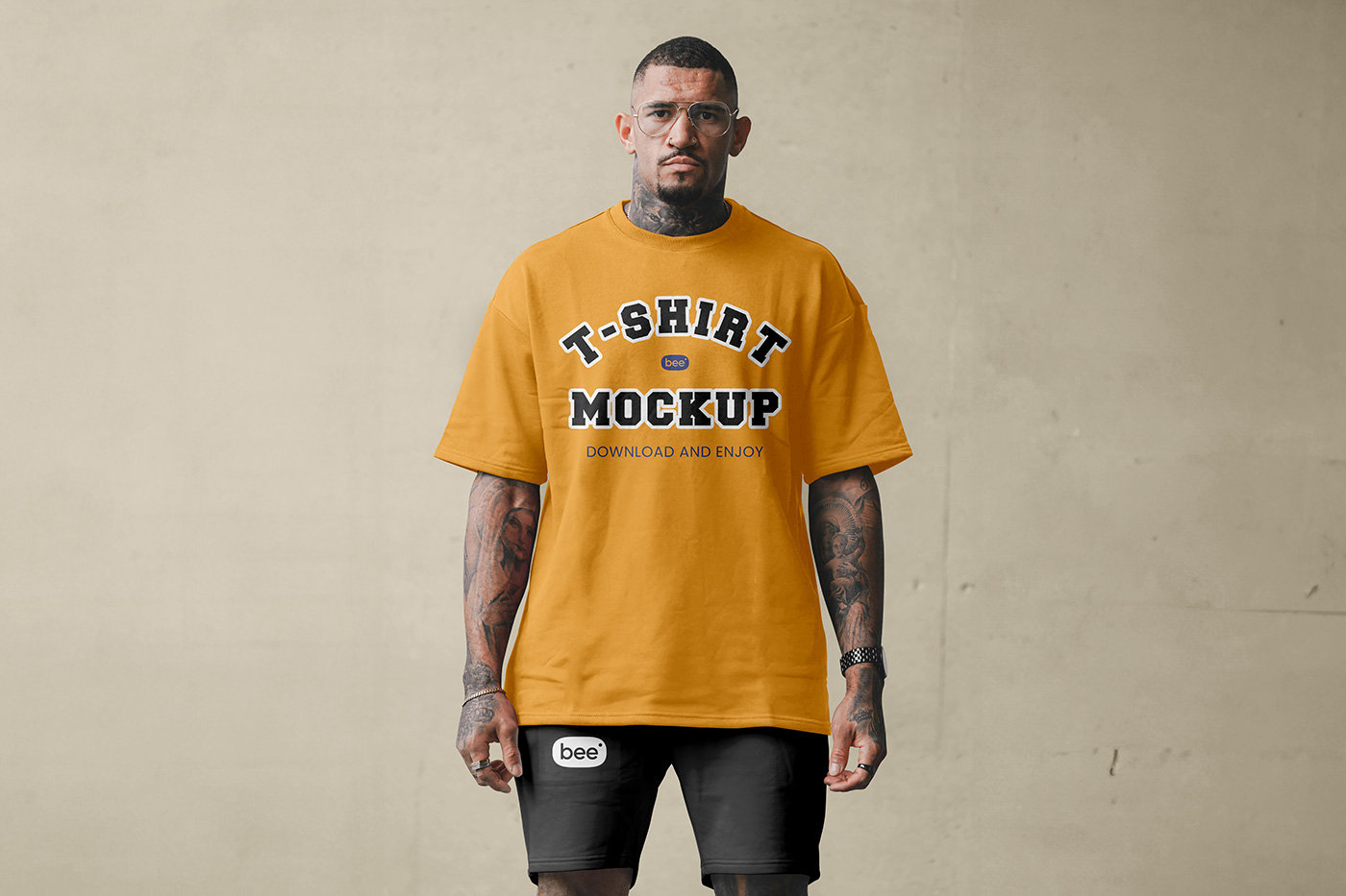Front View of Man Wearing Oversize T-Shirt and Shorts Mockup FREE PSD