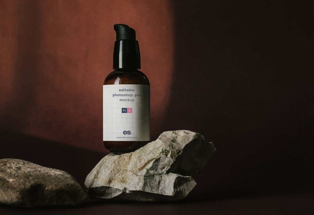 Front View of Mini Foam Pump Bottle Mockup above Real Rocks
