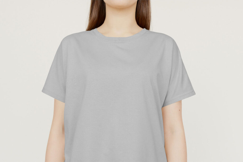 Front View of Round Neck T-shirt Mockup on Standing Woman