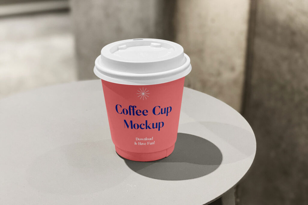 Front View of Small Coffee Cup Mockup on Table