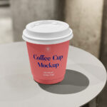 Front View of Small Coffee Cup Mockup on Table