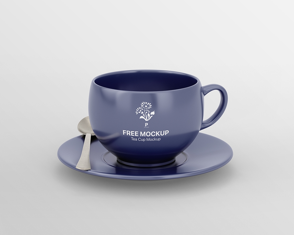 Front View of Tea Cup Mockup Featuring Saucer and Silver Spoon