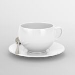 Front View of Tea Cup Mockup Featuring Saucer and Silver Spoon